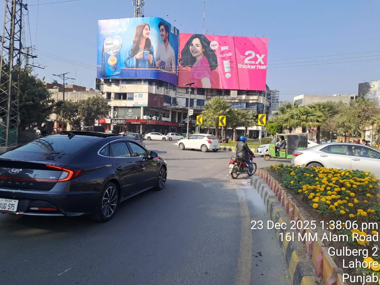 Mini Market Roundabout MM Alam Road Gulberg Lahore Billboard site for rent 